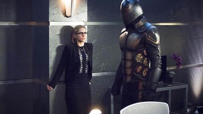 The Bug-Eyed-Bandit And Her Armored Henchman Attack Palmer Tech HQ In New ARROW Stills