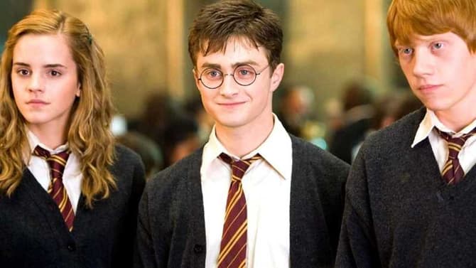 HARRY POTTER 20TH ANNIVERSARY First Look Photo Reunites Daniel Radcliffe, Rupert Grint, & Emma Watson