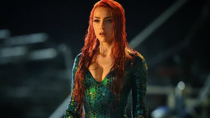 AQUAMAN: Amber Heard Shares A Behind The Scenes Look At Herself In Costume During Downtime Between Reshoots