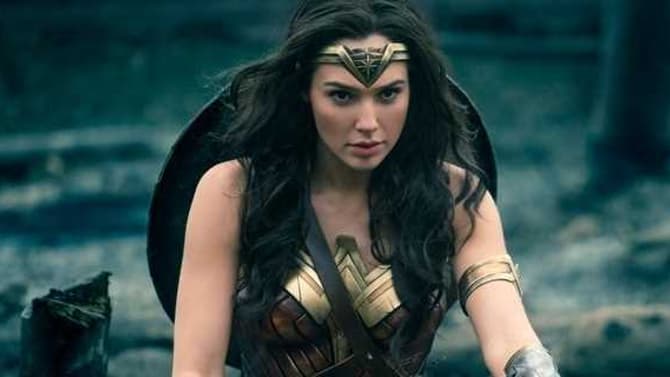 WONDER WOMAN Takes Cover In A New Image; Patty Jenkins Says Some Of Her THOR Ideas Made It Into The Movie