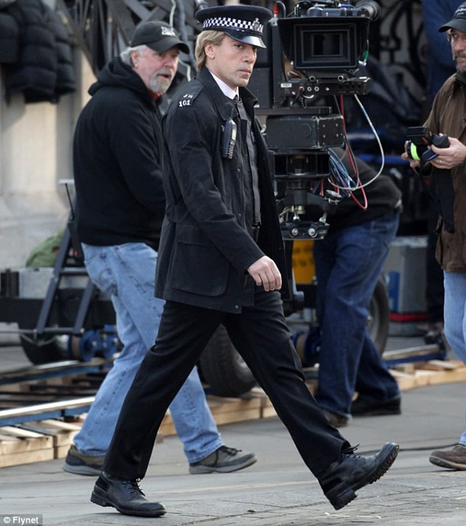 Here comes trouble: Javier Bardem hit the streets of London today to shoot scenes for the new James Bond movie Skyfall