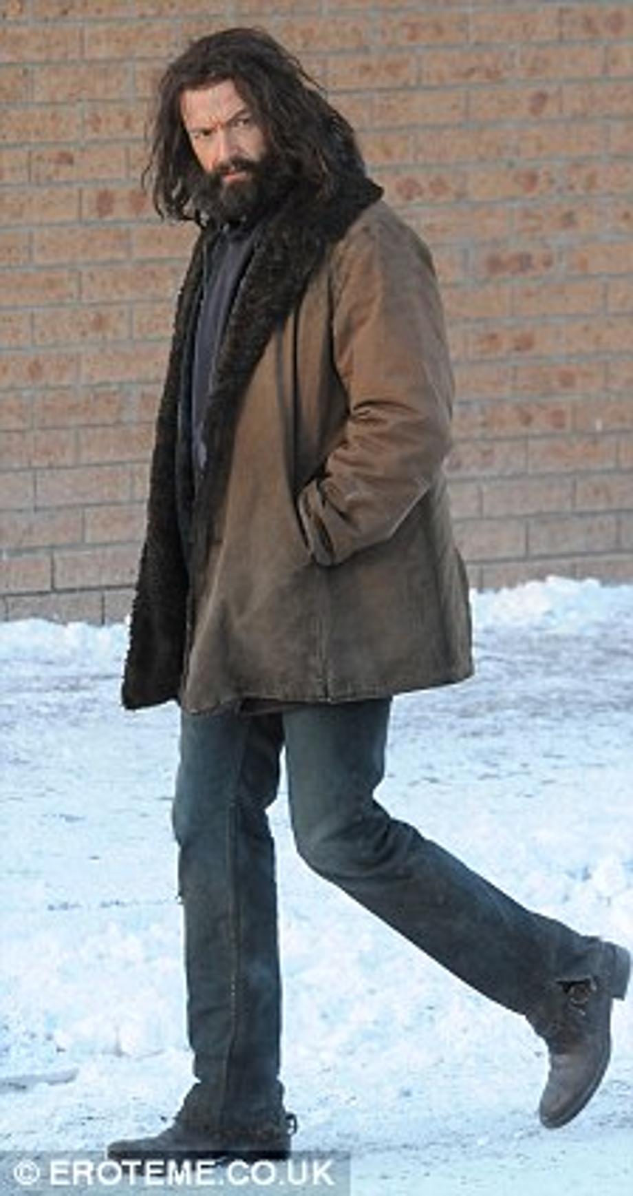 Unseasonable weather: Hugh appeared to be walking through snow as he filmed scenes for the new X-Men spin-off