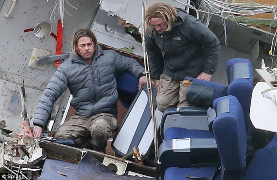 Falling down: Brad had a body double stunt man on set to show him how to fall from the plane seat 