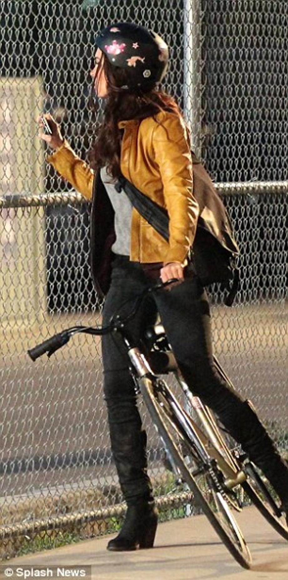 Riding along: Her main mode of transportation has been a bicycle as they film around the Big Apple