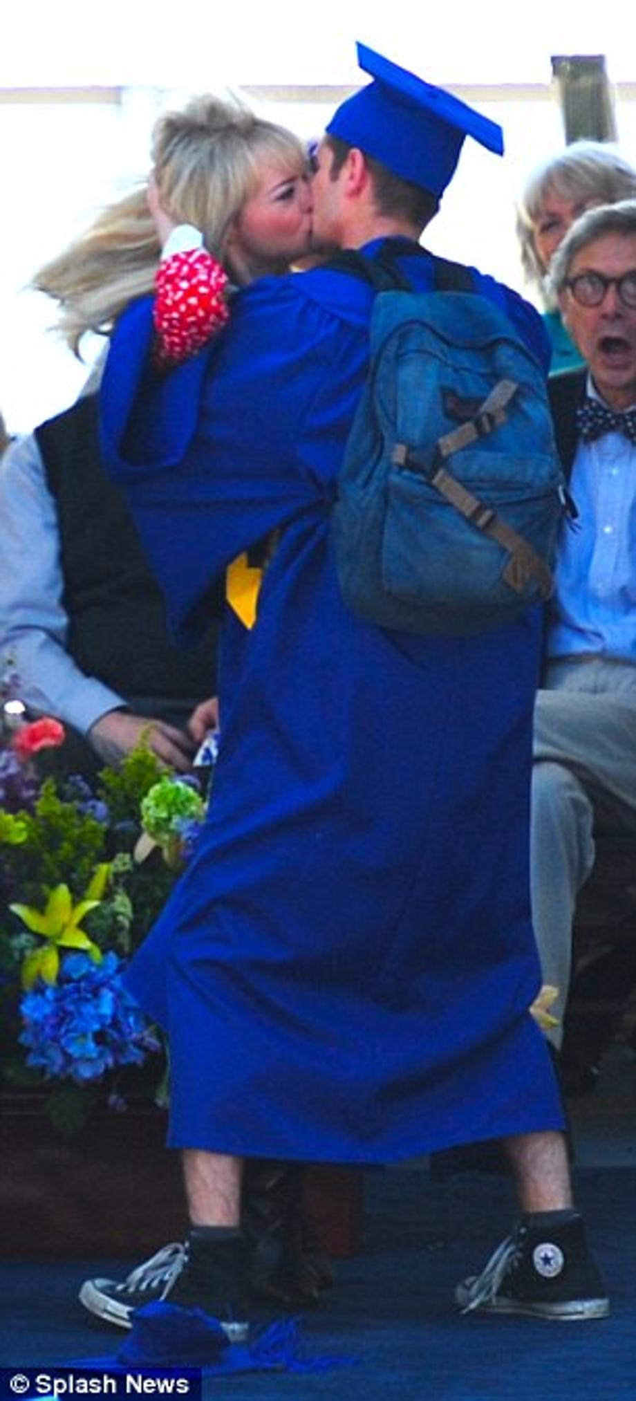 The big drop: The passionate embrace caused Emma to lose her hat