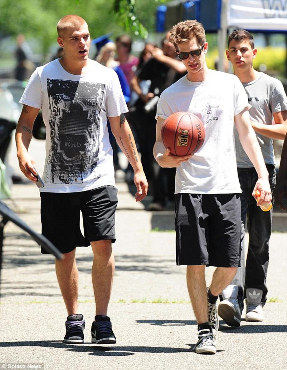 Downtime: Between takes Andrew kept limber with a game of basketball