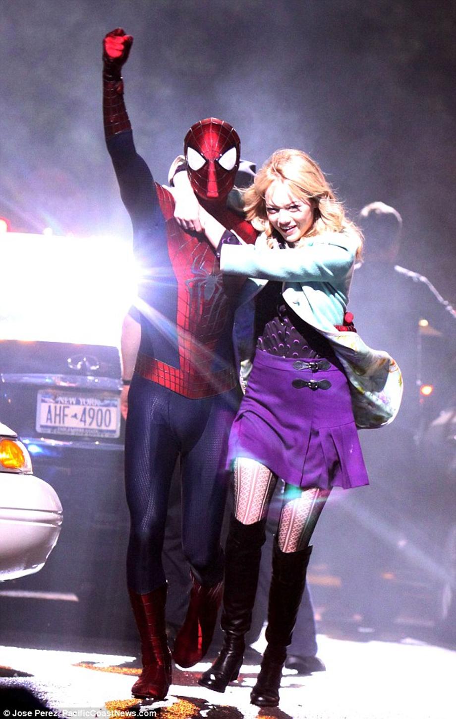 Get ready for lift-off: Dramatic new scenes show Garfield swinging on his web with girlfriend Emma Stone