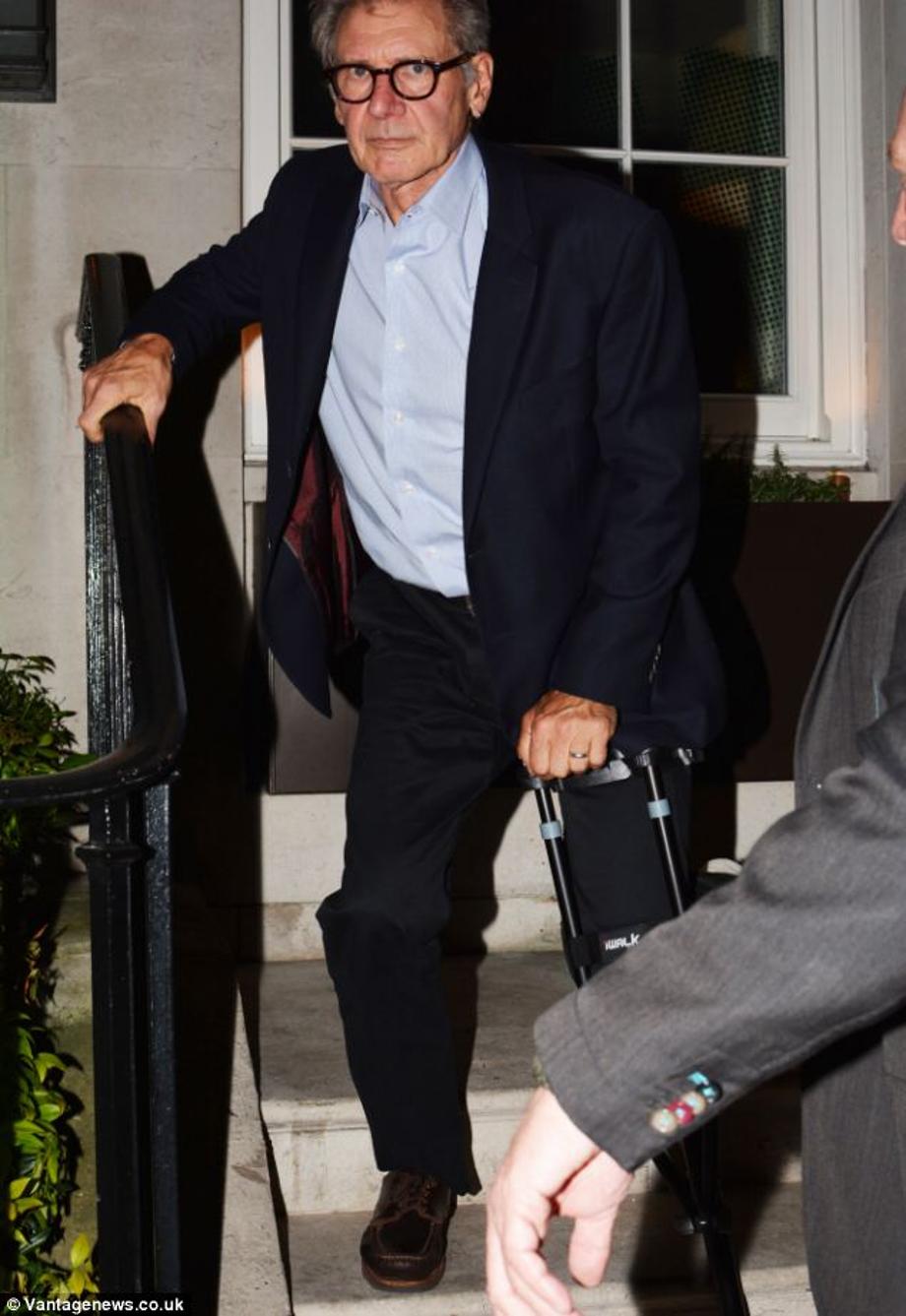 Out and about: The actor, looking dapper in a navy suit, had been at the exclusive 34 restaurant in Mayfair