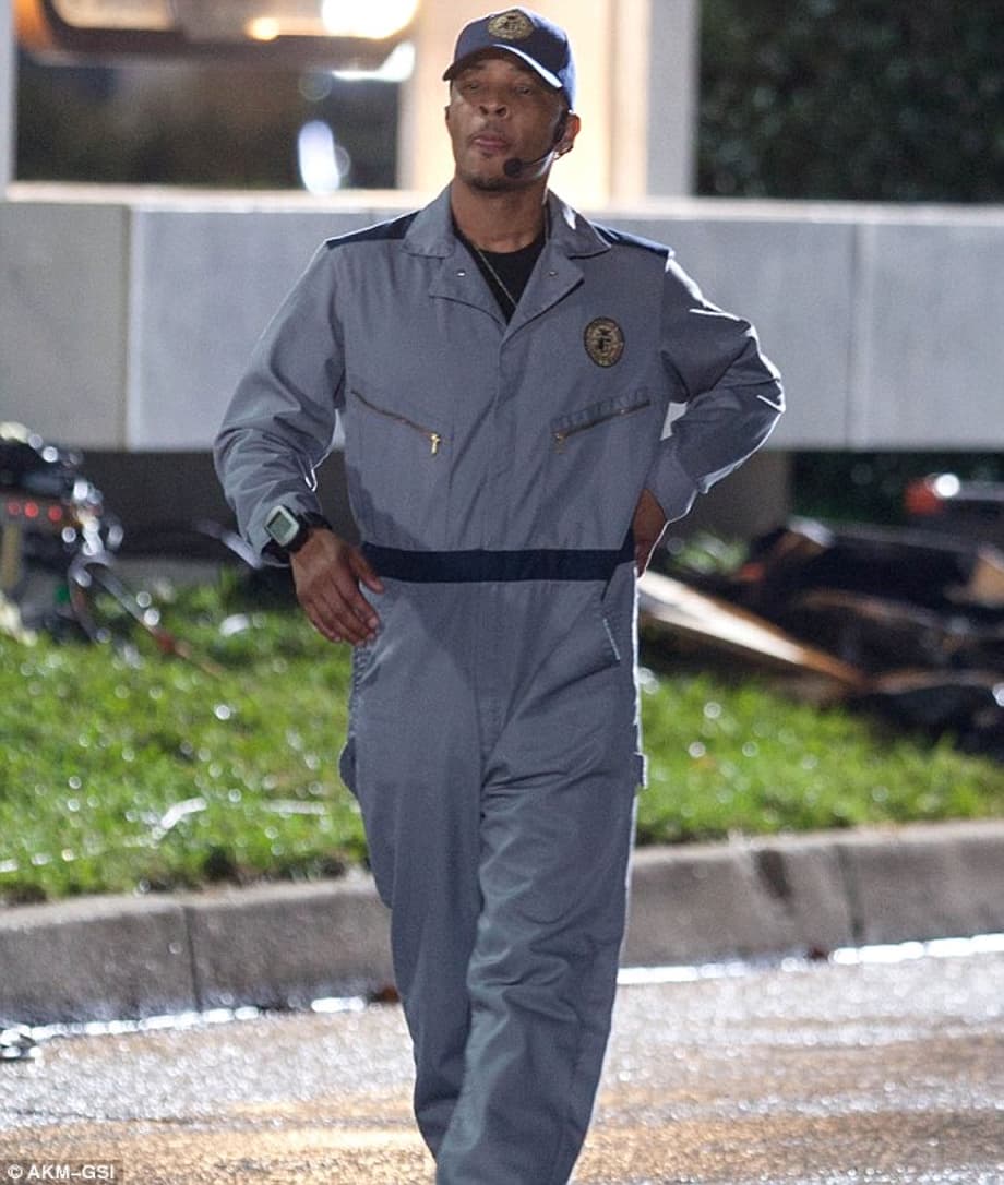Dressed down: TI was wearing blue overalls while filming his scene