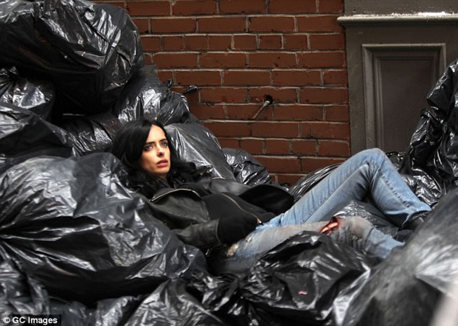 Less than glamorous: The actress was shot in a pile of rubbish with a less than glamorous appearance