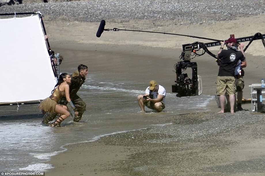 Getting the light just right: Mother-of-one Gal and Chris looked every inch the true professionals as they went through the motions