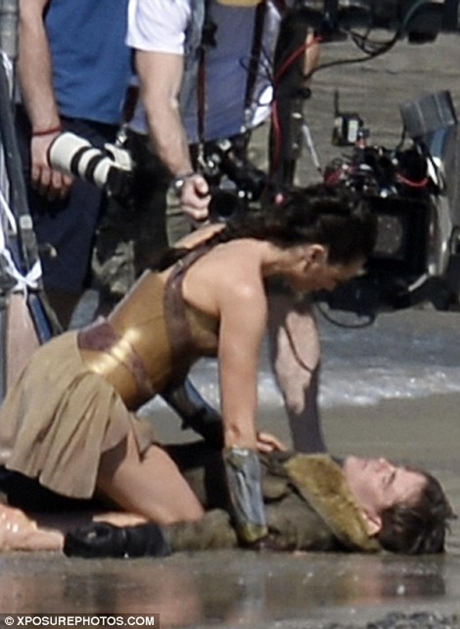 Doing her thing: She carefully caressed his body as she made sure he was OK.