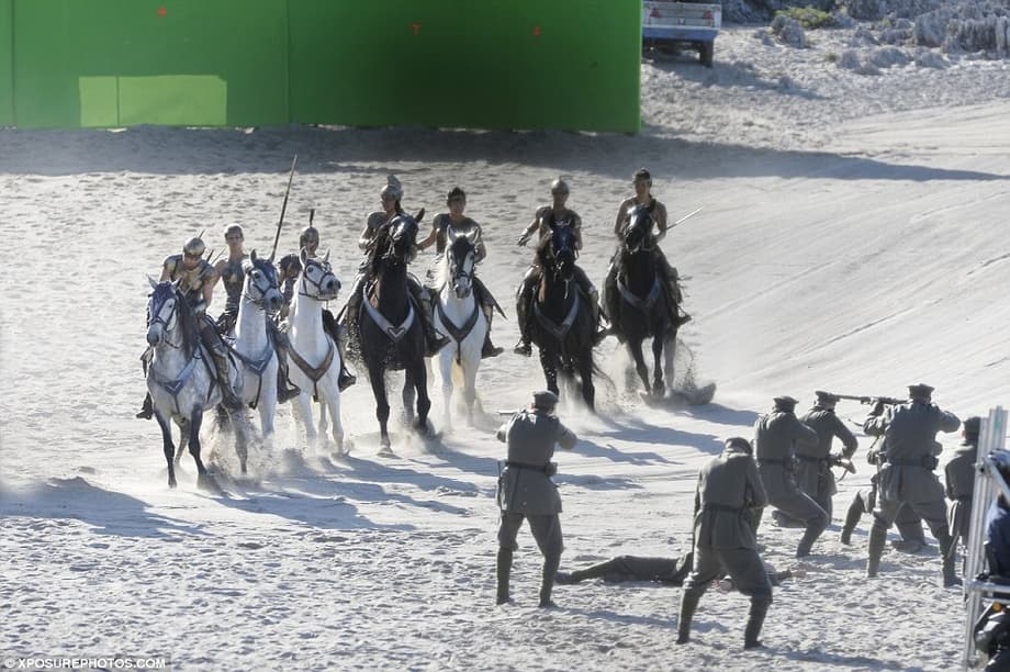 Troubled times: A battle scene ensues as a group of soldiers appear to attack them 