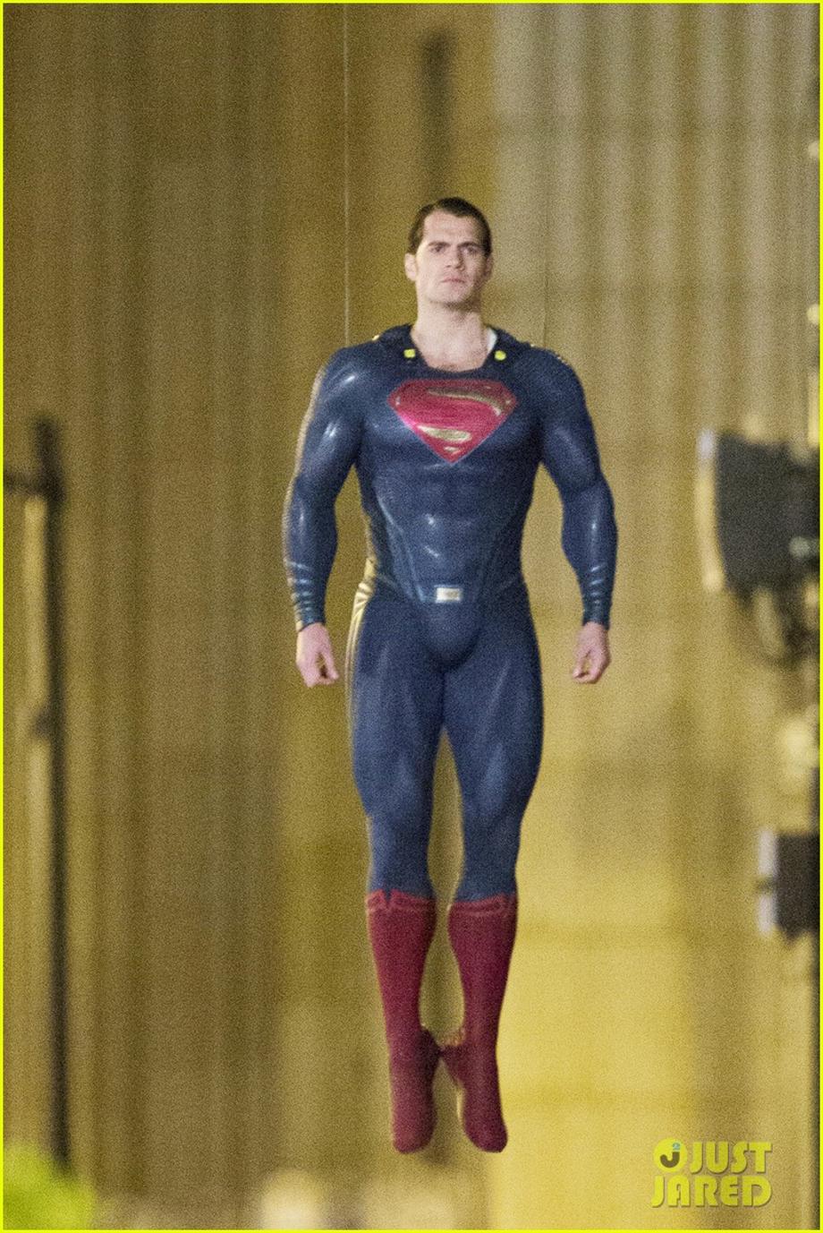 henry cavill hangs in the air in superman costume 01