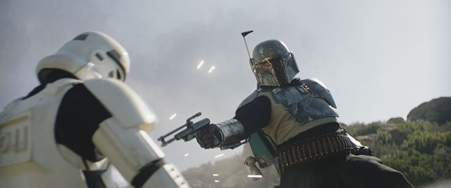 Grogu-and-the-Mandalorian-Pedro-Pascal-in-Lucasfilm-s-THE-MANDALORIAN-season-two-exclusively-on-Disn