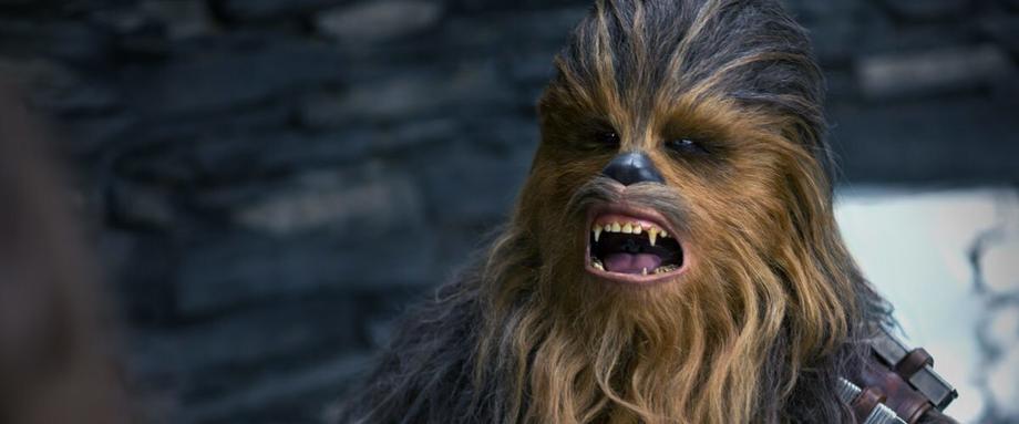 SOLO: A STAR WARS STORY Writers On The Film Being A &quot;Romance&quot; & How Chewie's Roars Are Handled In Scripts