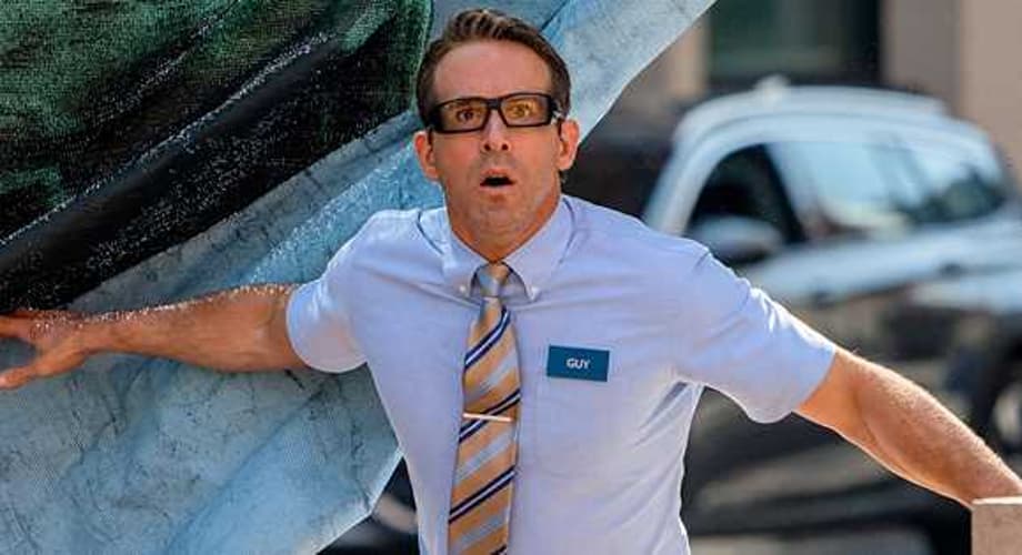 FREE GUY: New Stills Offer Fresh Looks At Ryan Reynolds, Jodie Comer, Utkarsh Ambudkar, & Taika Waititi