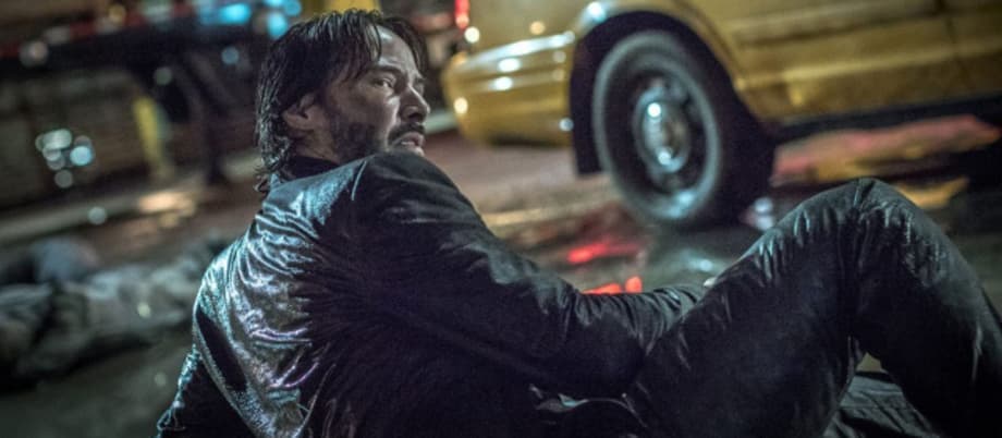 Keanu Reeves Is Packing Twice The Firepower On This Awesome New Poster For JOHN WICK: CHAPTER 2