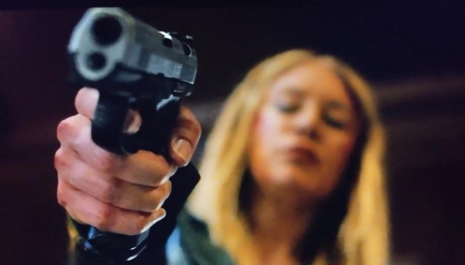 PEACEMAKER Star Jennifer Holland On Harcourt's Decision To Kill [SPOILER] & &quot;Throwing Mein Kampf At A Nazi&quot;