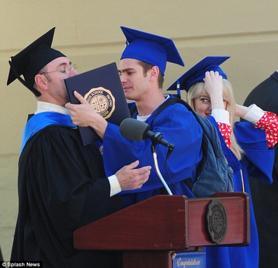 Your turn: Andrew then spun about to bestow a hug on a school official