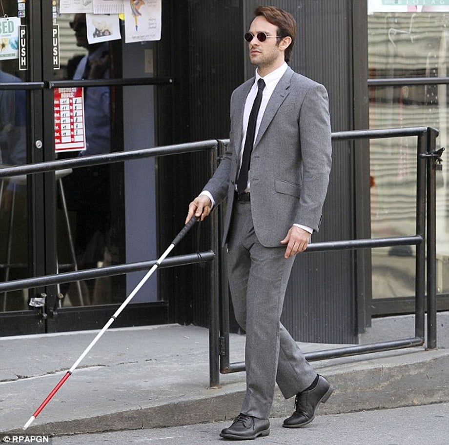 In character: Daredevil fans got their first glimpse of Charlie Cox dressed as blind lawyer Matt Murdock, the superhero's alter ego, as filming on the Netflix series got underway in New York on Monday