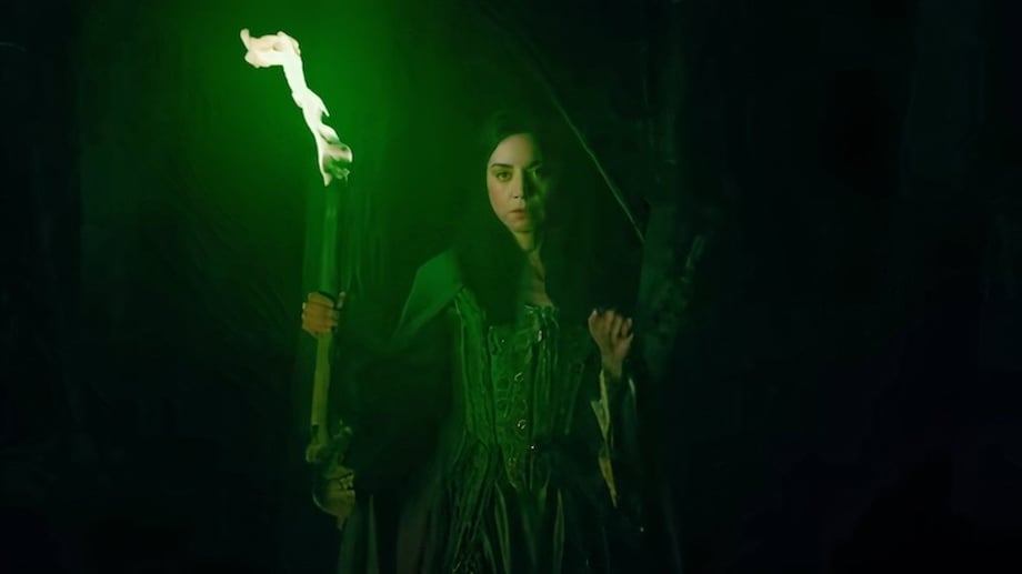 rio-vidal-holds-a-green-torch-in-a-forest-in-agatha-all-along-trailer