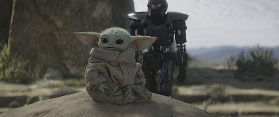 Grogu-and-the-Mandalorian-Pedro-Pascal-in-Lucasfilm-s-THE-MANDALORIAN-season-two-exclusively-on-Disn