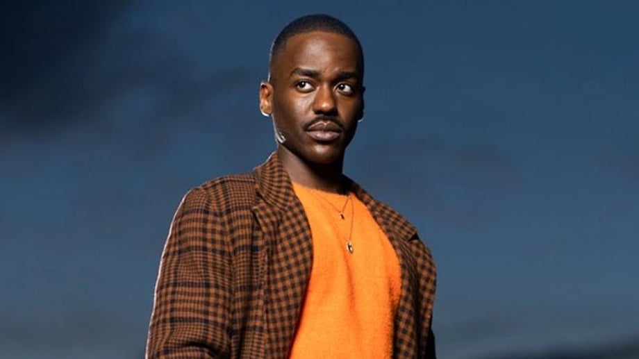 DOCTOR WHO Set Photo Reveals Another New Costume Ncuti Gatwa's Fifteenth Doctor As He Emerges From The TARDIS