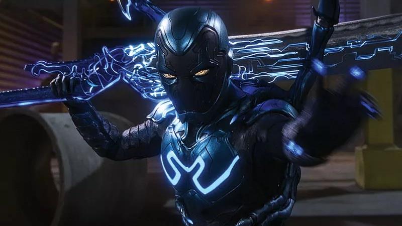 BLUE BEETLE Promo Art Reveals Battle With Carapax; Xolo Maridueña ...