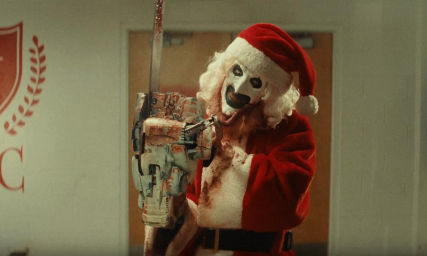 Art the clown decorates the halls with bloody corpses in a gruesome trailer